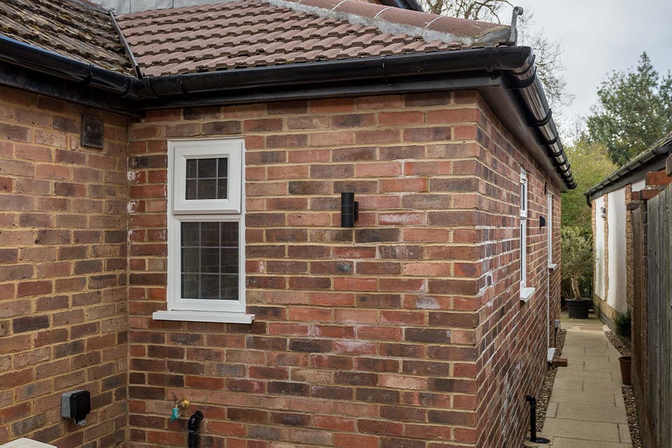 Close up of the brick work on a side extension of a house.