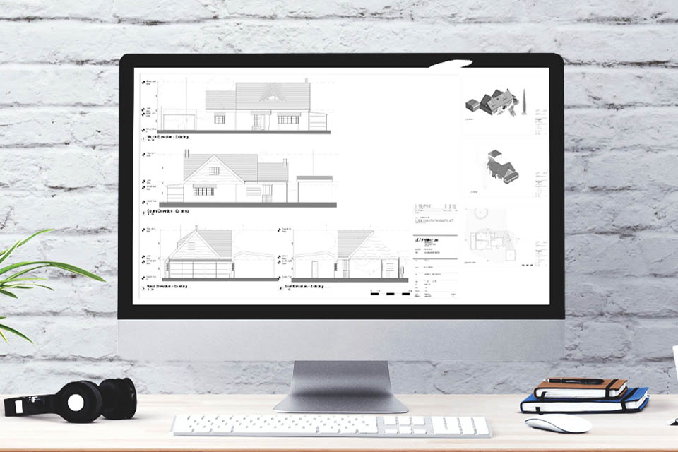 Planning application documents on a computer screen.